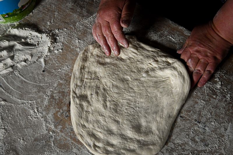 Authentic luce pizza being prepared fresh in our kitchen