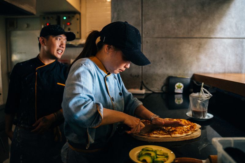 Warm and inviting interior dining room at Pizza luce