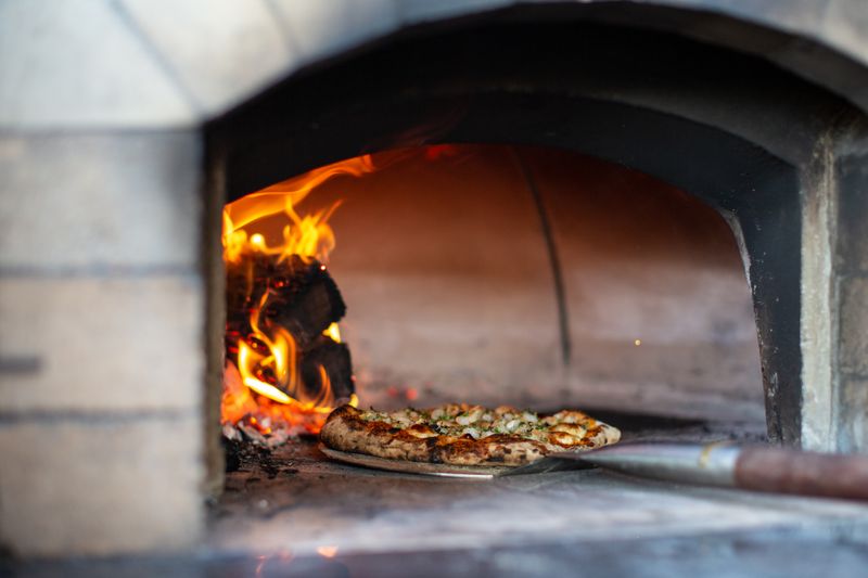 Community pizza night event at Pizza luce restaurant
